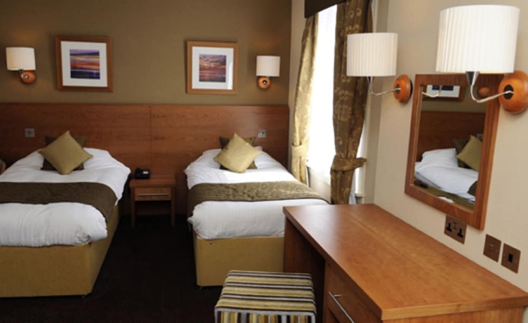 Imagen de la habitación del Hotel Golden Lion. Foto 13