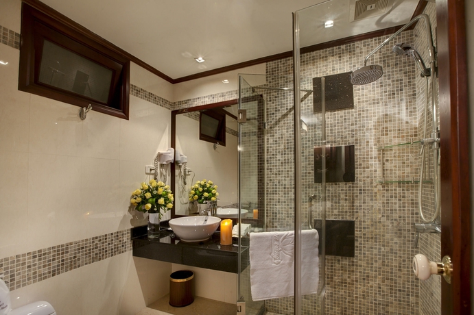 Imagen de la habitación del Hotel Golden Lotus Boutique. Foto 8