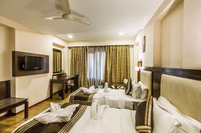 Imagen de la habitación del Hotel Golden Manor. Foto 15