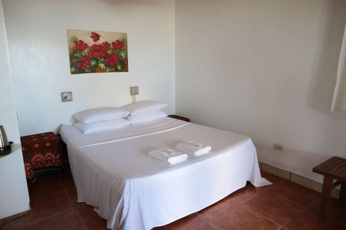 Imagen de la habitación del Hotel Golden Monkey Cottages. Foto 4
