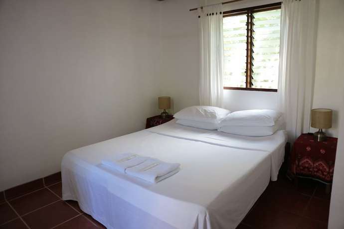 Imagen de la habitación del Hotel Golden Monkey Cottages. Foto 12