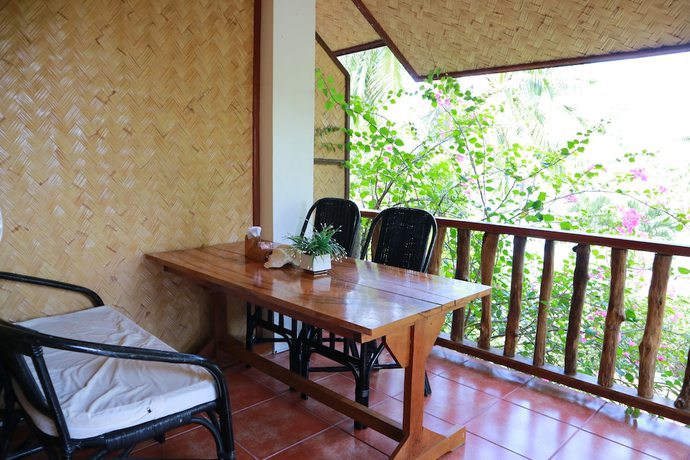 Imagen de la habitación del Hotel Golden Monkey Cottages. Foto 14