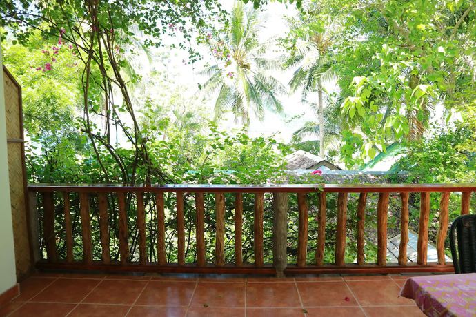 Imagen de la habitación del Hotel Golden Monkey Cottages. Foto 15