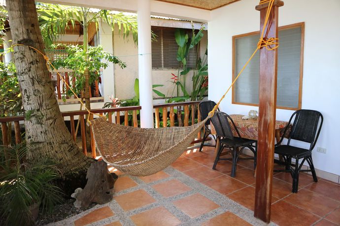 Imagen de la habitación del Hotel Golden Monkey Cottages. Foto 17