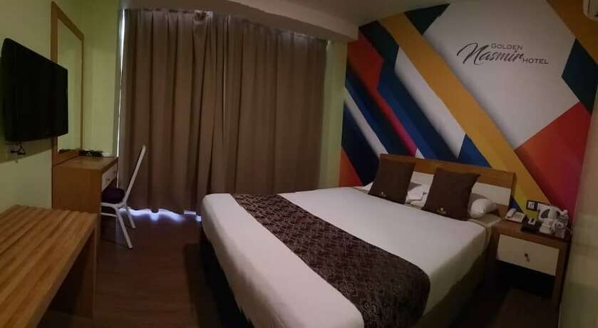 Imagen de la habitación del Hotel Golden Nasmir. Foto 15