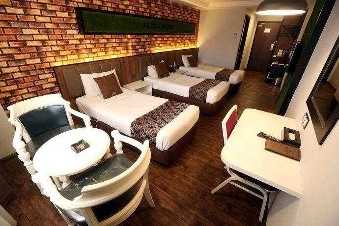 Imagen de la habitación del Hotel Golden Nasmir. Foto 17