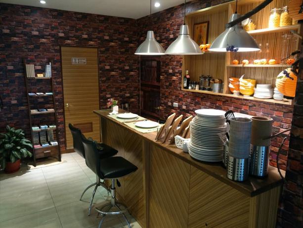 Imagen del bar/restaurante del Hotel Golden, Nuevo Taip&eacute;i. Foto 3