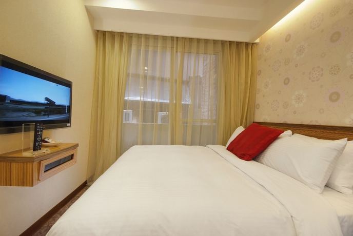 Imagen de la habitación del Hotel Golden, Nuevo Taip&eacute;i. Foto 17