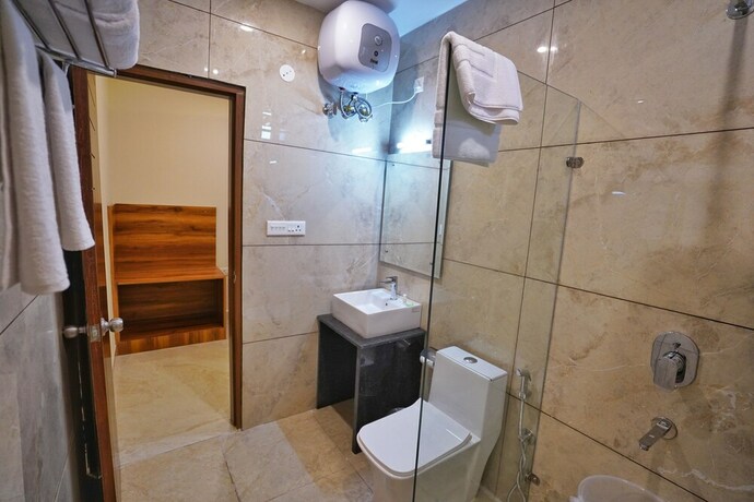 Imagen de la habitación del Hotel Golden Orchard. Foto 11