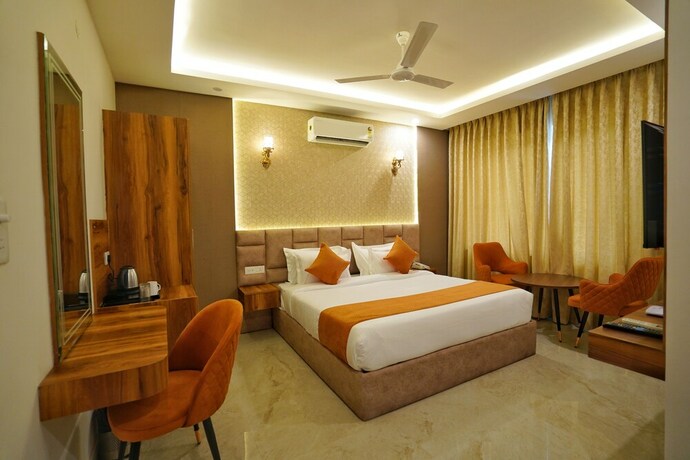 Imagen de la habitación del Hotel Golden Orchard. Foto 16
