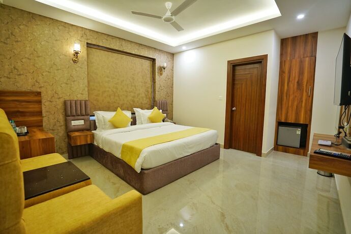 Imagen de la habitación del Hotel Golden Orchard. Foto 17