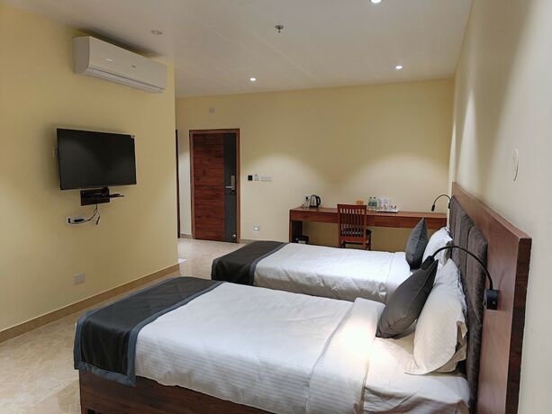 Imagen de la habitación del Hotel Golden Orchid, Dibrugarh. Foto 11