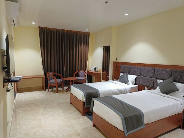 Imagen de la habitación del Hotel Golden Orchid, Dibrugarh. Foto 13