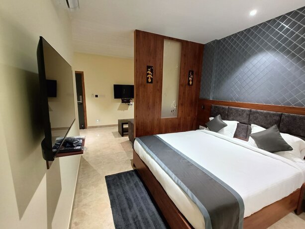 Imagen de la habitación del Hotel Golden Orchid, Dibrugarh. Foto 15