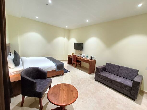 Imagen de la habitación del Hotel Golden Orchid, Dibrugarh. Foto 16