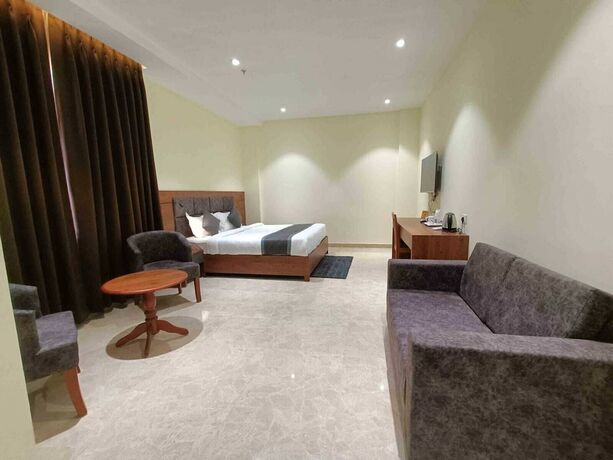 Imagen de la habitación del Hotel Golden Orchid, Dibrugarh. Foto 17