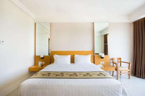 Imagen de la habitación del Hotel Golden Palace Lombok. Foto 9