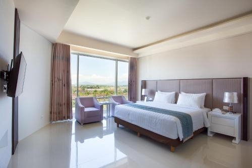 Imagen de la habitación del Hotel Golden Palace Lombok. Foto 10