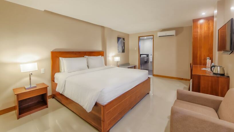 Imagen de la habitación del Hotel Golden Palm Resort. Foto 15