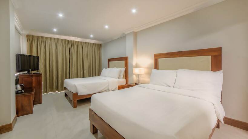 Imagen de la habitación del Hotel Golden Palm Resort. Foto 19