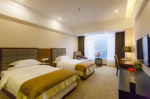 Imagen de la habitación del Hotel Golden Palm, Zhuhai. Foto 1