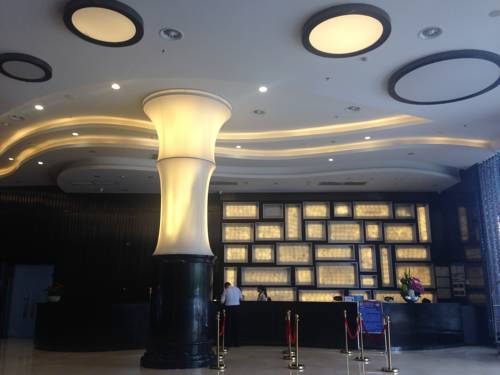 Imagen de la habitación del Hotel Golden Palm, Zhuhai. Foto 5