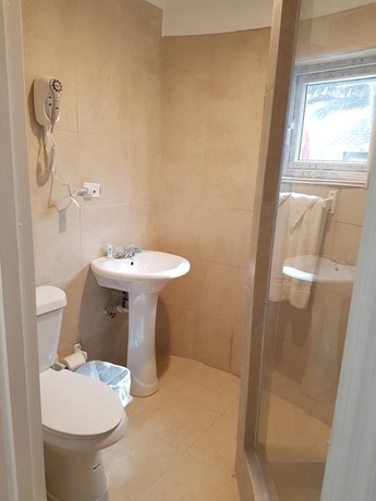 Imagen de la habitación del Hotel Golden Palms B and B. Foto 5