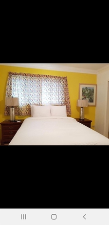Imagen de la habitación del Hotel Golden Palms B and B. Foto 10