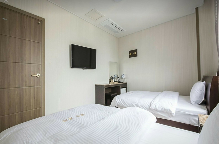 Imagen de la habitación del Hotel Golden Park, Jeju. Foto 9