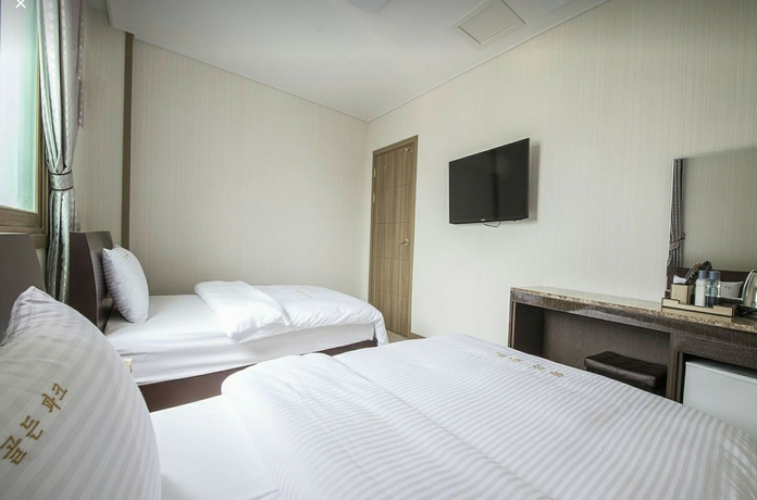 Imagen de la habitación del Hotel Golden Park, Jeju. Foto 10