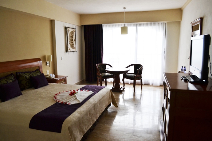 Imagen de la habitación del Hotel Golden Parnassus Resort & Spa. Foto 10