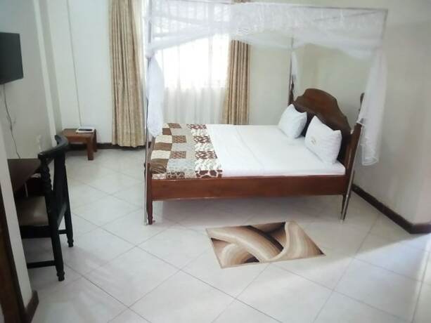 Imagen de la habitación del Hotel Golden Peace. Foto 17