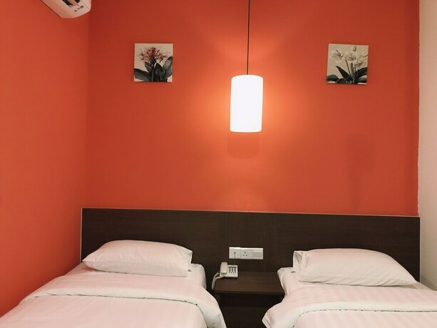 Imagen de la habitación del Hotel Golden Peak Inn. Foto 22