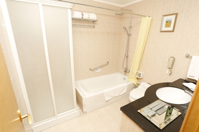 Imagen de la habitación del Hotel Golden Pebble International Convention Centre and Resort. Foto 6