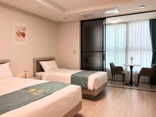 Imagen de la habitación del Hotel Golden Planet Incheon. Foto 18