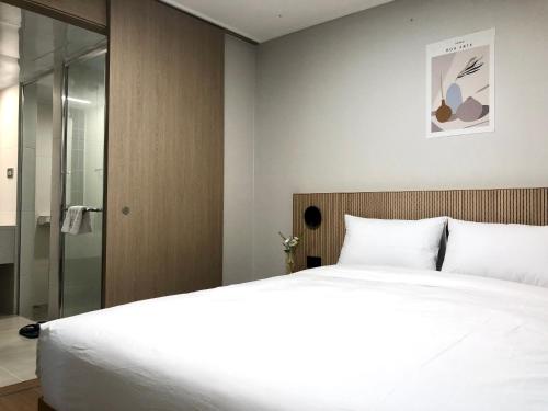 Imagen de la habitación del Hotel Golden Planet Incheon. Foto 20