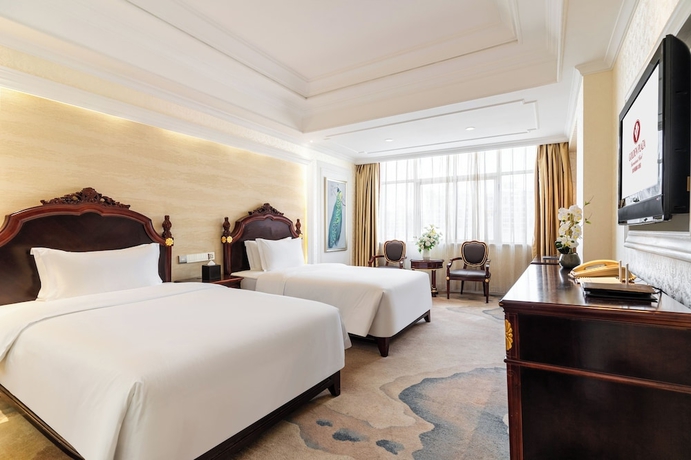 Imagen de la habitación del Hotel Golden Plaza International. Foto 7