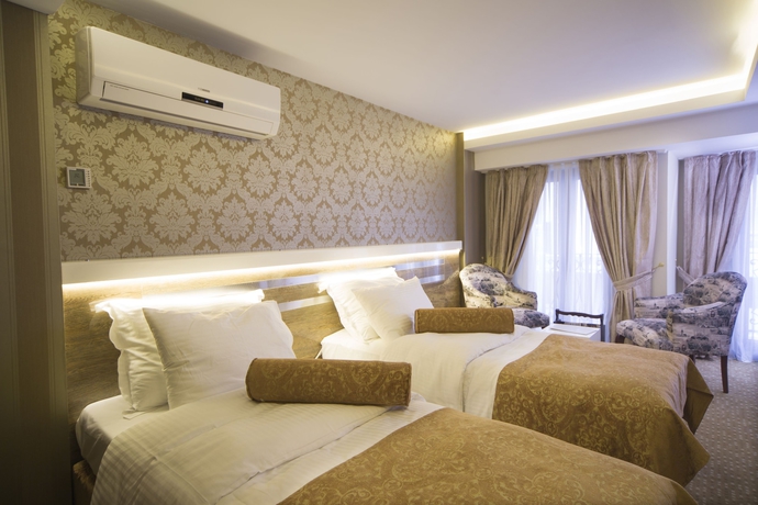 Imagen de la habitación del Hotel Golden Rain Old City. Foto 13