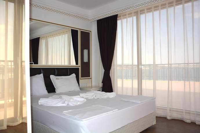 Imagen de la habitación del Hotel Golden Rainbow VIP Residence. Foto 12