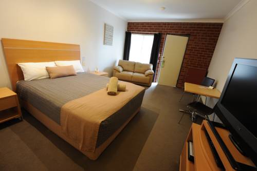 Imagen de la habitación del Hotel Golden Reef Motor Inn. Foto 4