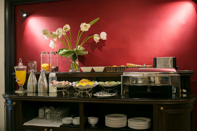 Imagen del bar/restaurante del Hotel Golden Rooster. Foto 5