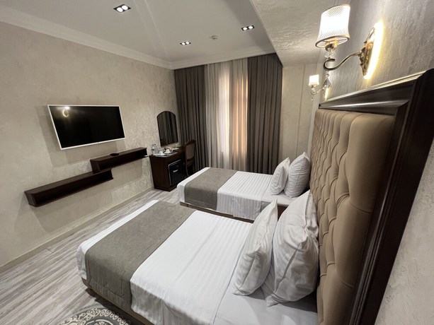 Imagen de la habitación del Hotel Golden Samarkand. Foto 13