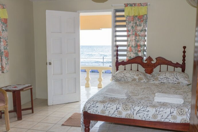 Imagen de la habitación del Hotel Golden Sands Guest House. Foto 13