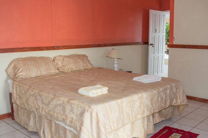 Imagen de la habitación del Hotel Golden Sands Guest House. Foto 14