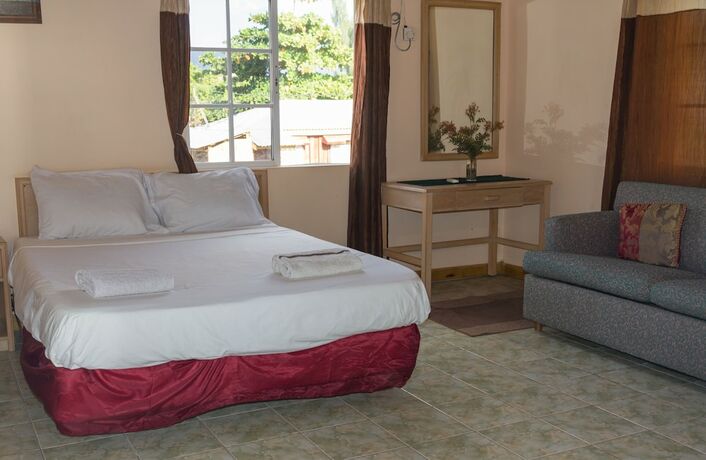 Imagen de la habitación del Hotel Golden Sands Guest House. Foto 15