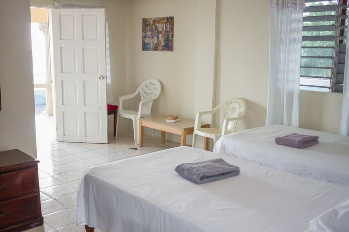 Imagen de la habitación del Hotel Golden Sands Guest House. Foto 16