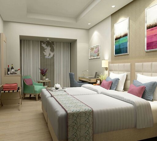 Imagen de la habitación del Hotel Golden Sarovar Portico Amritsar. Foto 13