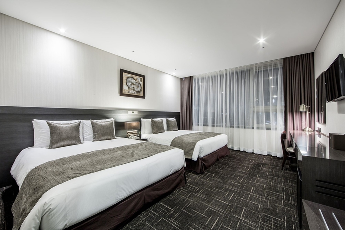 Imagen de la habitación del Hotel Golden Seoul. Foto 8