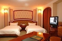 Imagen de la habitación del Hotel Golden Shine International Dalian. Foto 3