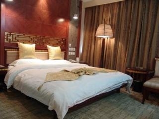 Imagen de la habitación del Hotel Golden Spring, Kunming. Foto 7
